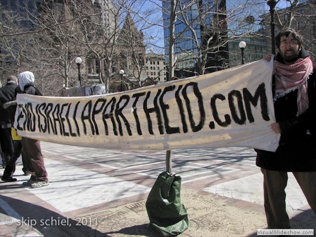 37. Boston University Students hold banner